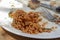 Close-up shoot of red tomato rice on the plate half eaten