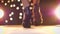 Close-up shooting of footwear in lights, high heel of female, walking from camera on glowing background indoors