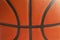 Close up shot of a basketball showing the seams