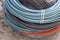 Close-up shot for blue, black and orange colored cable wires