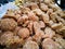 A close up shot of a bowl of Jaggery. It is a concentrated product of cane juice & often date or palm sap without separation of