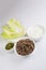  close up shot of a bowl of sliced beef fillet pieces, a plate of cellophane glass noodles, a cup of Vietnamese Nuoc Cham