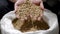 Close-up shot of a brewer holding wheat barley in a hands for beer brewing.