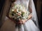 Close up shot of bride holding a beautiful bouquet of flowers