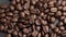 Close-up shot of brown hot roasted coffee beans