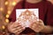 A close-up shot of a child\\\'s hands holding a beautifully decorated Eid mubarak idul adha greeting card