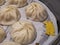 Close up shot of a Chinese style pork Xiao Long Bao