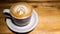 Close up shot coffee cup latte art