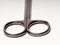 Close up shot of curved stainless steel medical scissor