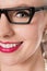 Close up shot of cute studious girl wearing spectacles,