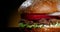 Close-up shot of delicious burger. Rotating - hamburger, cooking 4k footage.