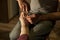 Close up shot of devoted man cutting helping nails of his mother Health Care concept cutter image