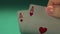 Close up shot of dice and gambler\'s hand holding pair of aces, game addiction