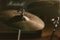 close-up shot of drum cymbal under spotlight