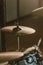 close-up shot of drum cymbals under spotlight