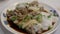 Close up shot of duck meat rice noodle roll
