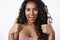 Close-up shot enthusiastic and charismatic good-looking african american girl look upbeat, show thumbs-up gesture and