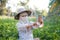 Close up shot farmer using mobile smartphone in the nature farm