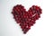 Close-up shot of fresh raspberries in the shape of a heart - perfect for diet and the benefits of natural vitamins for