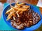 Close up shot of fried ribeye steak and french fries