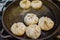 Close up shot of frying the  homemade Shui Jian Bao