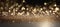 A close-up shot of glamorous gold and silver glitter glistening under radiant lights, creating a luxurious atmosphere for an