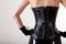 Close-up shot of gothic woman in leather corset