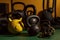 A close-up shot of gym equipment, such as dumbbells, resistance bands, or kettlebells, highlighting the variety of tools available