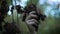 Close up shot of hand with long nails, a woman touches the dry leaves of a tree in the park, a mystical atmosphere