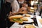 close-up shot. hands holding fresh chicken toast at cooking classes