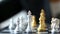 Close up shot hands of man and business woman moving gold chess and silver chess on chess board game for winner and loser busine