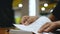 Close up shot hands of woman tearing paper notebook select focus