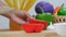 Close up shot Hands of woman using kitchen knife slice and cut the bell pepper