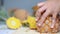 Close up shot hands of women using kitchen knife to cutting and peeling ripe pineapple shallow depth of field with ambient sound