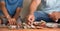 Close up shot, Indian father and son taking money by breaking clay money pot - concept of Family Savings, Saving