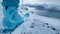 Close up shot of an individual skiing in the stunning beauty of a natural winter landscape