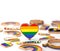 Close up shot on LGBT rainbow heart standing on white background. Copy space above on the top for your text. 3D rendering