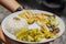 Close up shot of a lunch plate with deep fried Orange Daylily, chicken and rice