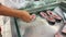 Close up shot of man choosing cut fish and put inside plastic bag in a supermarket.