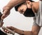 Close up shot of man getting trendy haircut. Male hairstylist serving client, making haircut using machine and comb. the concept