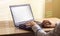 Close up shot of a man working on computer with blended image of an trading statement. Trading