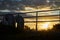 Close-up shot of massive ventilation pipes outdoors during a sunset