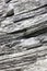 A close-up shot of the natural rocky hillside of Corniglia in Cinqueterre, Italy