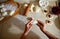 Close-up shot of pastry chef hand sculpting cherry dumplings on kitchen countertop background. Cherry dumpling lying on the wooden