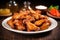 close-up shot of a plate of spicy wings glazed in chili sauce