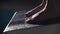 Close up shot of a professional female swimmer\'s feet preparing to jump off the starting block into the swimming pool