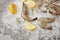 close-up shot of raw shrimps with rosemary and lemon slices on crushed ice