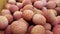 Close up shot of red exotic chinese lychee fruits, 4K video, TOP VIEW SLOW MOTION