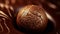 A close-up shot of a rich, glossy ball of Venezuelan chocolate with intricate swirls and textures