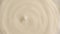 Close up shot of rotating mayonnaise swirl.